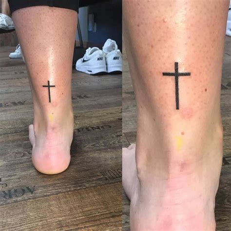 cross on calf tattoo|small cross tattoo designs.